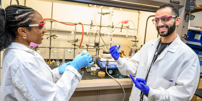 Dr. Maia Popova and students in a chemistry lab